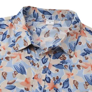 Close-up detail view of a men's Hawaiian floral short sleeve shirt for casual beach wear
