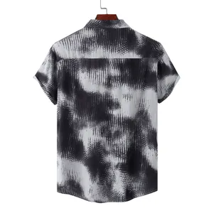 Back view of a men's short sleeve beach shirt with black and white tie-dye pattern