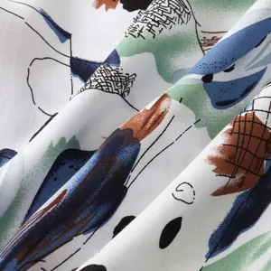 Macro shot of breathable cotton fabric with colorful abstract artistic print for summer
