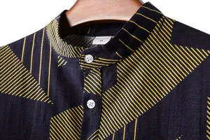 Close-up of mandarin collar on men's navy and yellow striped linen shirt