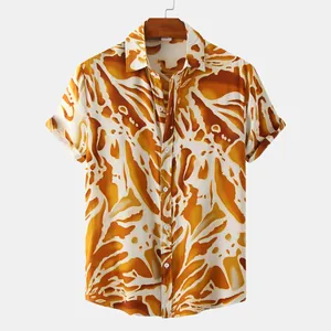 Detail of men's summer short sleeve shirt with vibrant orange abstract floral print