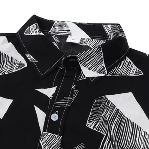 Detailed view of the collar and geometric print on a men's Hawaiian beach shirt