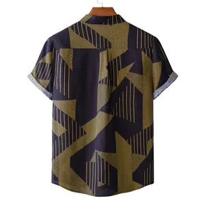 Detail view of men's short-sleeved casual shirt with yellow geometric patterns.