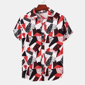 Detail of a men's short-sleeved shirt featuring a red and black geometric pattern.