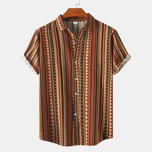 Close-up of men's short-sleeve casual shirt featuring intricate ethnic tribal patterns