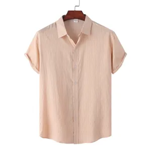 Detail of a men's light orange vertical striped short-sleeved casual beach shirt on a hanger