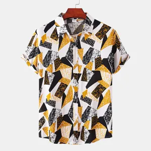 Detailed front view of men's short sleeve shirt with yellow and black geometric patterns