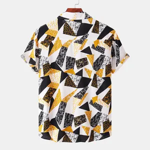 Back view of men's short-sleeve shirt with bold geometric mustard yellow and black print