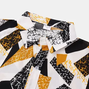 Detail of men's short sleeve shirt featuring geometric abstract patterns and collar