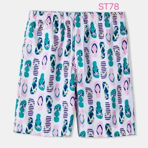 Lightweight men's breathable beach shorts featuring a colorful flip-flop pattern print