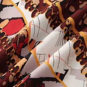 Close-up macro view of the intricate floral print fabric on a men's short sleeve shirt