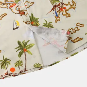 Close-up detail of tropical map print men's short sleeve casual shirt hem and side slit
