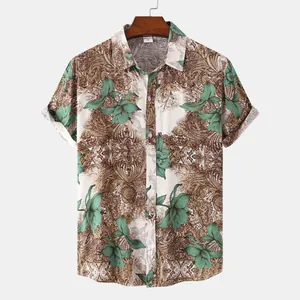 Detailed view of men's short sleeve shirt with green floral and brown paisley patterns