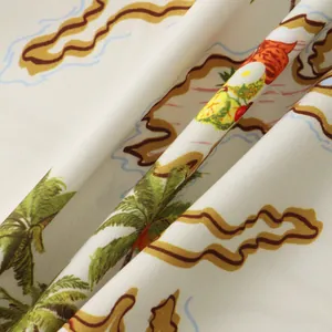 Macro detail of breathable tropical print fabric for men's casual summer shirt.