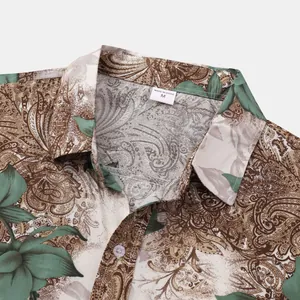 Close-up detail of men's paisley floral print shirt collar with a white size M neck label