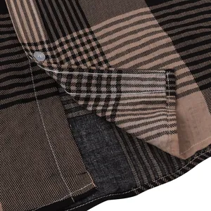 Close-up of plaid fabric and stitching detail on a men's summer Hawaiian shirt