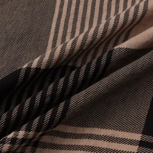 Close-up macro view showing the breathable fabric pattern on a men's beach shirt