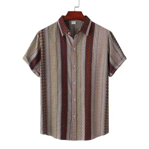 Detail shot of men's short-sleeved Hawaiian shirt featuring ethnic geometric patterns