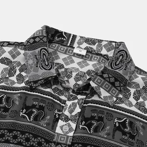 Detail view of men's short sleeve shirt featuring retro elephant and geometric patterns.