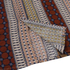 Close-up of ethnic geometric print and quality stitching on casual Hawaiian beach shirt