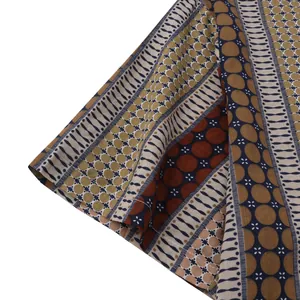 Close-up detail of men's short sleeve with bohemian ethnic geometric print and stitching