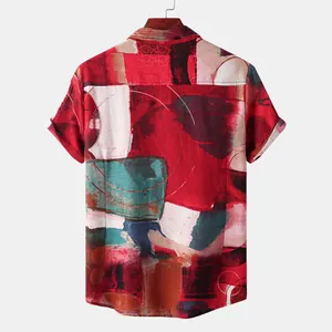 Back view of a men's short sleeve shirt featuring a vibrant red ethnic abstract print