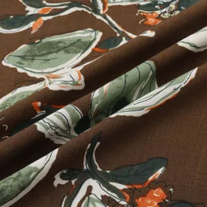 Détail haute résolution de tissu à imprimé floral botanique marron pour chemises d'été