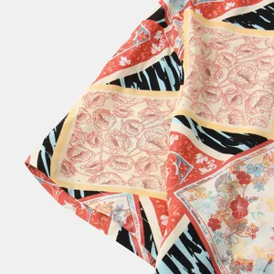 Detailed macro shot of the vintage floral and animal print fabric on a men's shirt sleeve