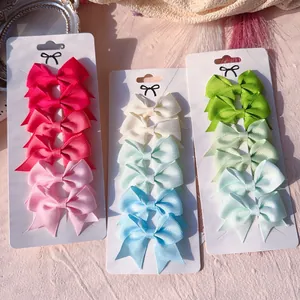 Set of mini grosgrain ribbon bow hair clips in vibrant candy colors for children