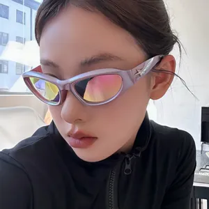 Close-up of model wearing purple Y2K cat-eye sunglasses with star detail and mirrored lenses.