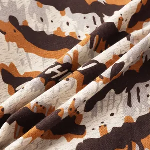 Close-up of ethnic pattern fabric showing high-quality woven texture for men's shirt