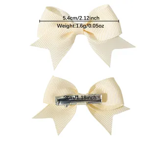 Mini cream grosgrain ribbon bow hair clip for babies and children, 2-inch size.