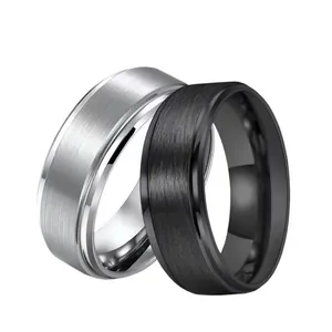 Brushed stainless steel rings for men in silver and black with polished beveled edges