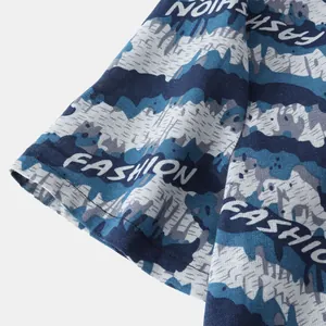 Macro view of blue wavy pattern with FASHION lettering on men's casual shirt sleeve