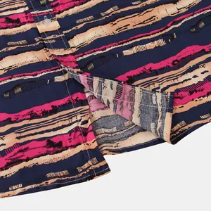 Close-up detail of men's striped short sleeve shirt showing fabric and hem stitching.
