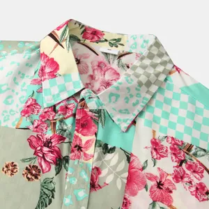 Close-up detail of a colorful floral and checkered print men's short sleeve shirt fabric