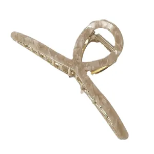 Elegant large beige acetate hair claw clip with cream marble pattern for women's hair