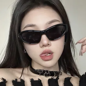 Stylish Y2K black cat-eye sunglasses with UV400 protection shown on an Asian female model