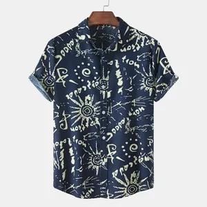 Detailed macro view of men's navy casual shirt with ethnic tribal sun print patterns