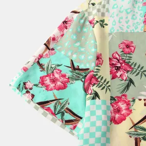 Close-up of men's short sleeve shirt showing patchwork floral and leopard print details.