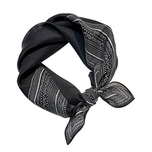 Elegant black and white silk cotton bandana scarf featuring a classic paisley pattern