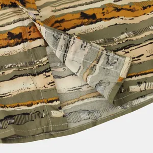 Close-up detail view of a men's striped shirt showing premium fabric texture and stitching