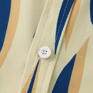 Close-up of a men's summer shirt showing fine stitching and white button detail.