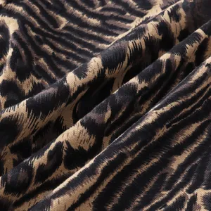 Macro detail of breathable leopard print fabric weave for men's casual long sleeve shirt