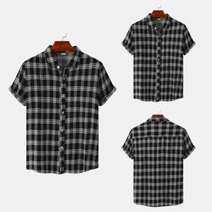 Front and back views of men's short sleeve black and white plaid shirt on wooden hangers