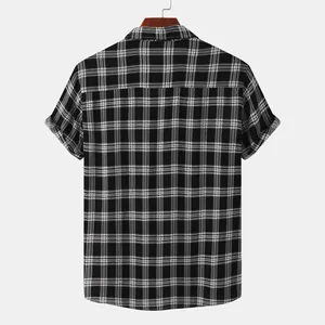 Detailed back view of a men's classic black and white plaid short-sleeved casual shirt
