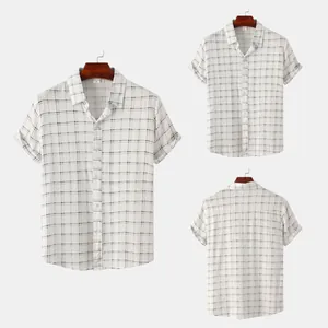 Front and back detail of a men's slim fit plaid short sleeve shirt in white and black