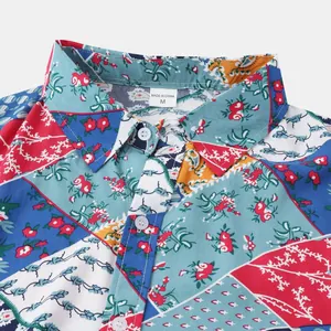 Gros plan sur le col d'une chemise de plage pour hommes à fleurs avec étiquette M