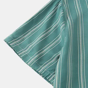 Close-up view of the short sleeve detail on a men's teal striped summer button-up shirt