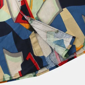 Close-up of vibrant abstract geometric pattern and stitching on a men's summer casual shirt